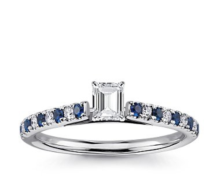 The Queen Diamond - 0,20 ct Zentraldiamant + 0,20 ct Seitensteine / 0,20 ct Saphir Diamantring in Weissgold